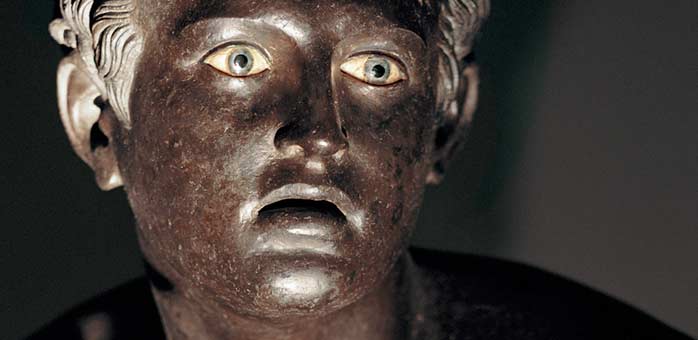 Plakatmotiv der Ausstellung - Kopf einer Läufer-Skulptur aus der Villa dei Papiri 